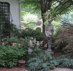 Shady Bed with Pan Statue
